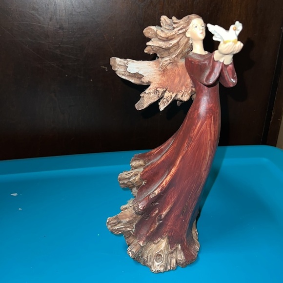 Christmas angel holding turtle dove looks like she’s part of a tree holiday deco - Picture 3 of 7